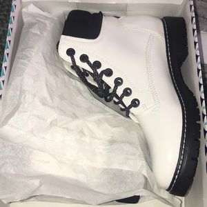 White and black boots